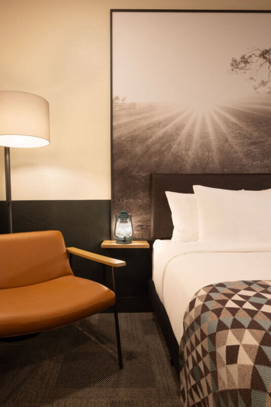 King or Two Queen Room detail shot of chair next to bed