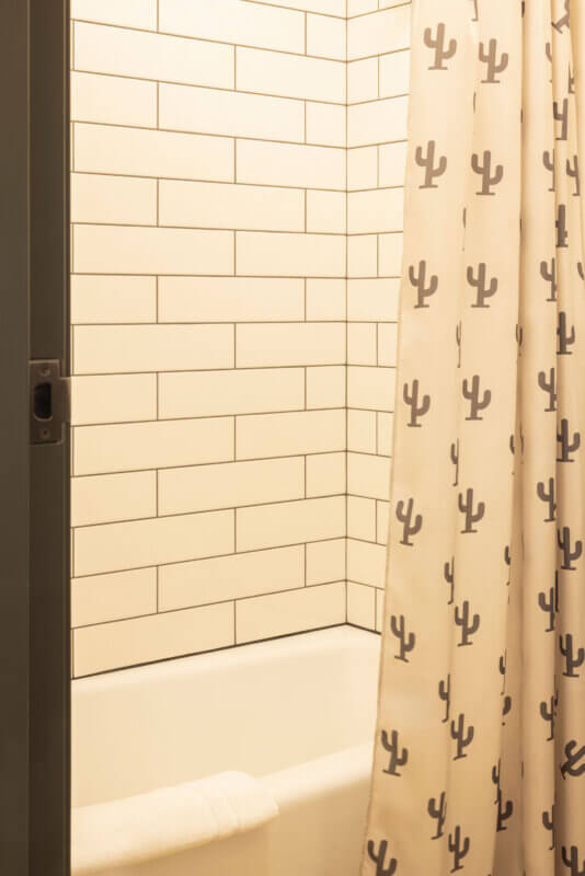 Shower tub combo with decorative shower curtain