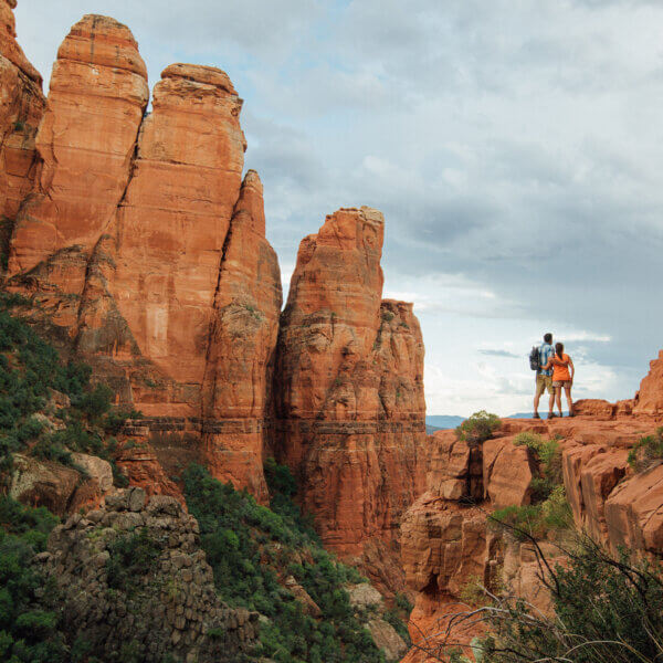couple at Cathedral Rock overlook after a hike
