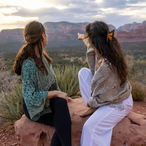 Two women on scenic overlook of Sedona