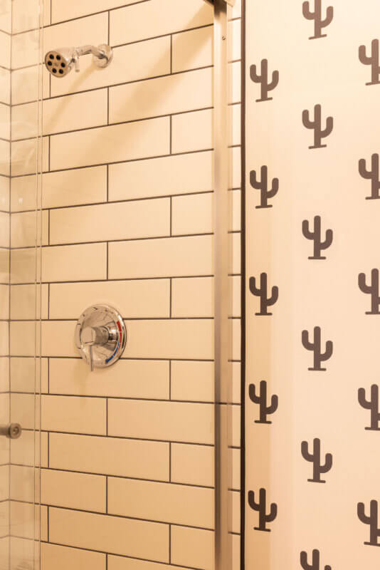 Tile and design work in guest room bathrooms